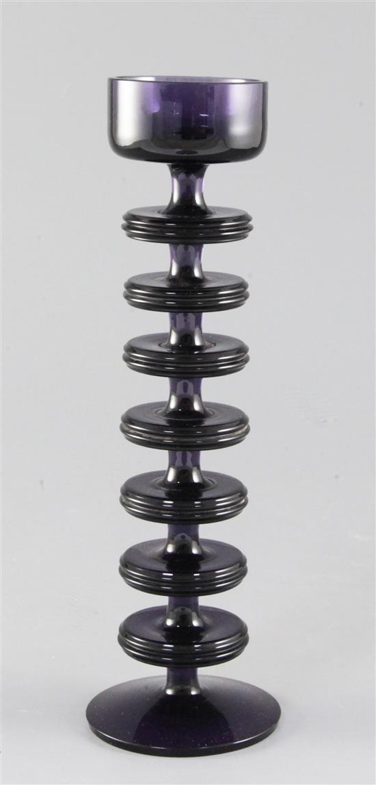 Ronald Stennett-Willson for Wedgwood. A Sheringham seven disc purple glass candlestick, 26.8cm